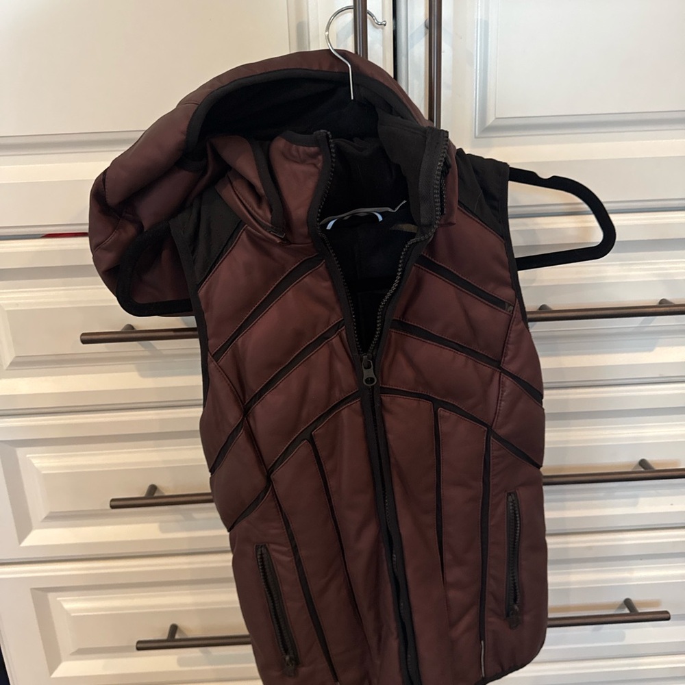Blanc noir hooded puffer vest with removable hood . maroon with black accents